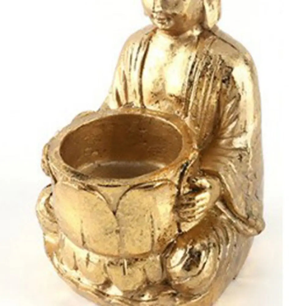 Statue Bouddha avec bougie